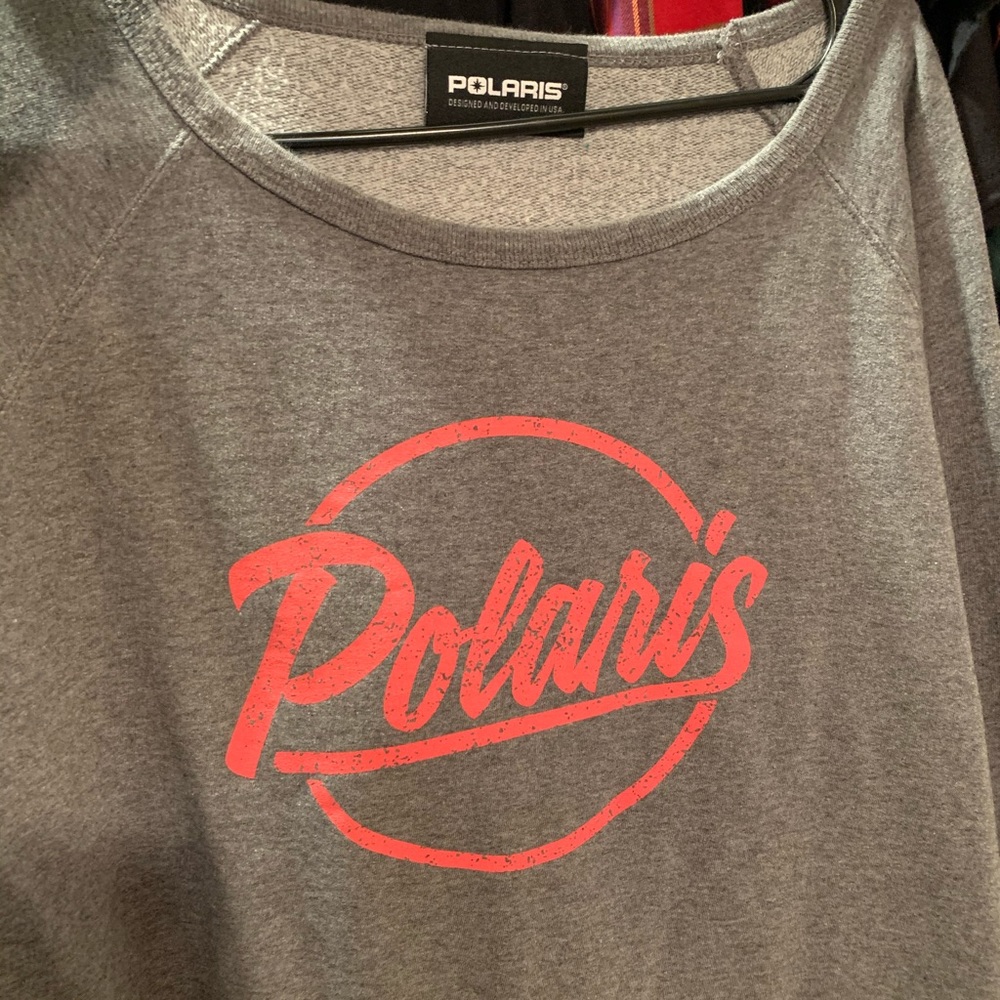 Woman’s Polaris sweatshirt.